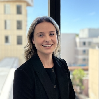 Renae Ahern standing smiling at RHIP